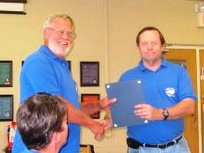 Fred & John Fred Coleman recieving award