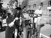 Festival participants using hand cranked machine