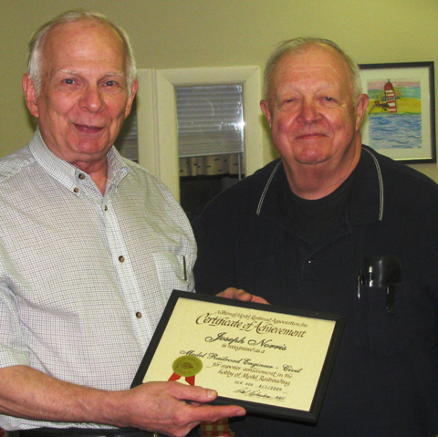Mike DeVore keeps 
  track of the trains 
operating at Fall by the Rails 
at Black Mountain.